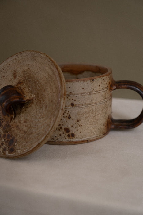 Antique stoneware pot with lid