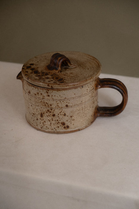 Antique stoneware pot with lid