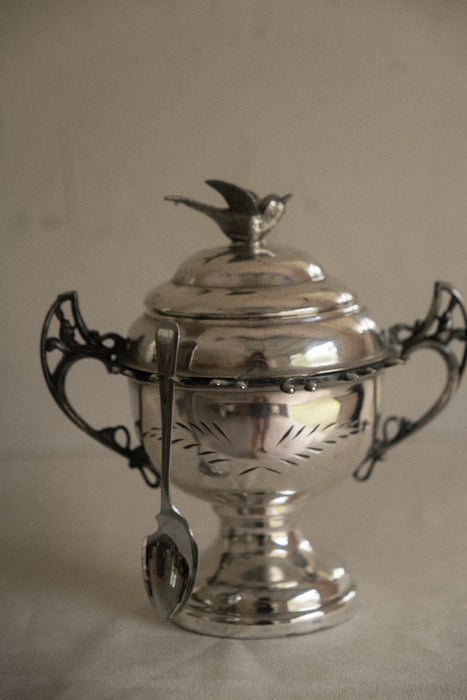 Vintage chrome sugar bowl with bird motif