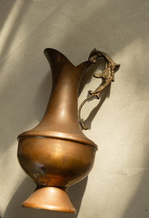 Antique decorative copper pitcher