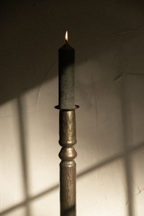 Vintage primitive candle stick holder