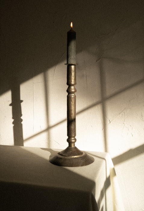 Vintage primitive candle stick holder