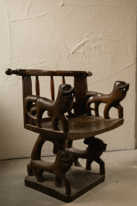 Antique primitive African tribal lion chair