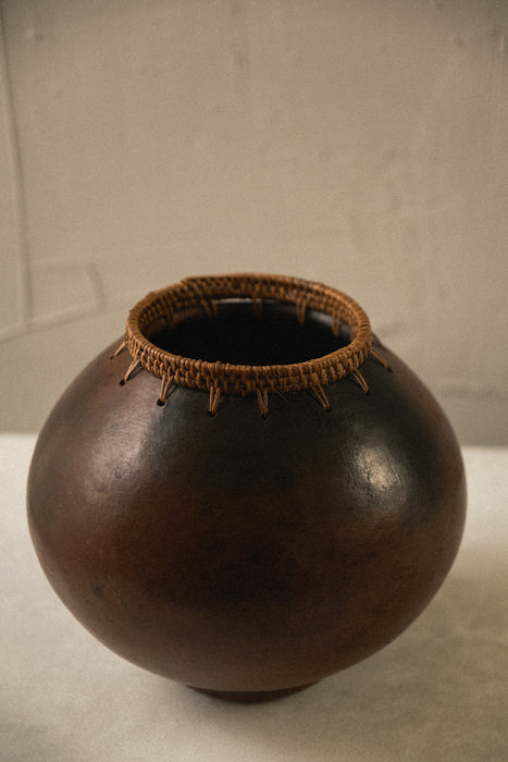 Vintage gourd style woven vessel